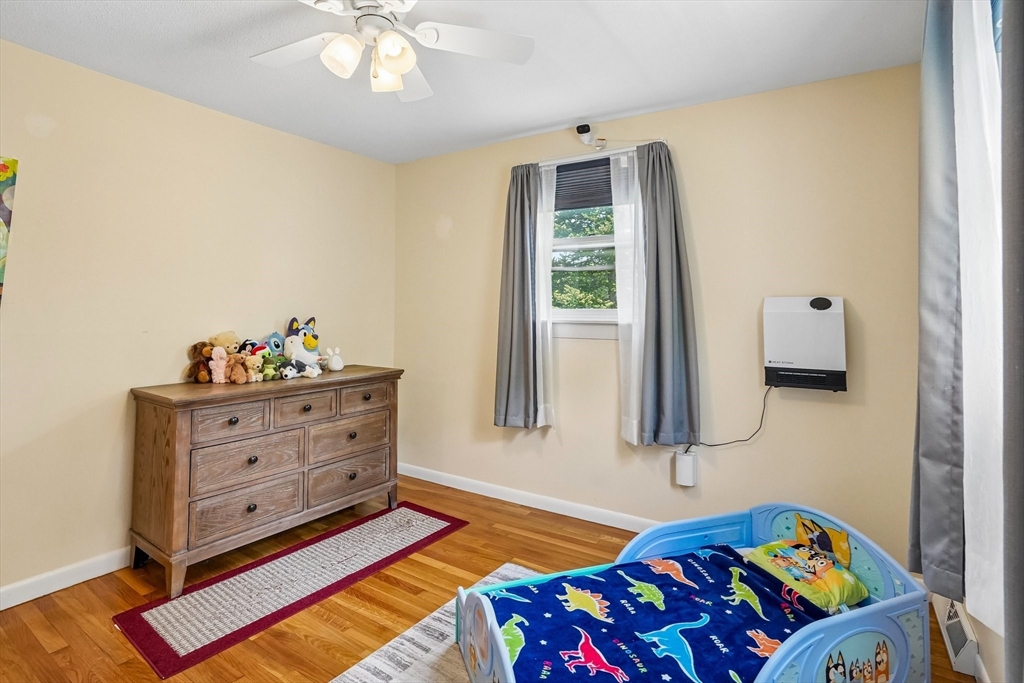 35 Westgate Road Framingham, MA 01701 - Photo 22 of 37 a bed room with a bed and a window