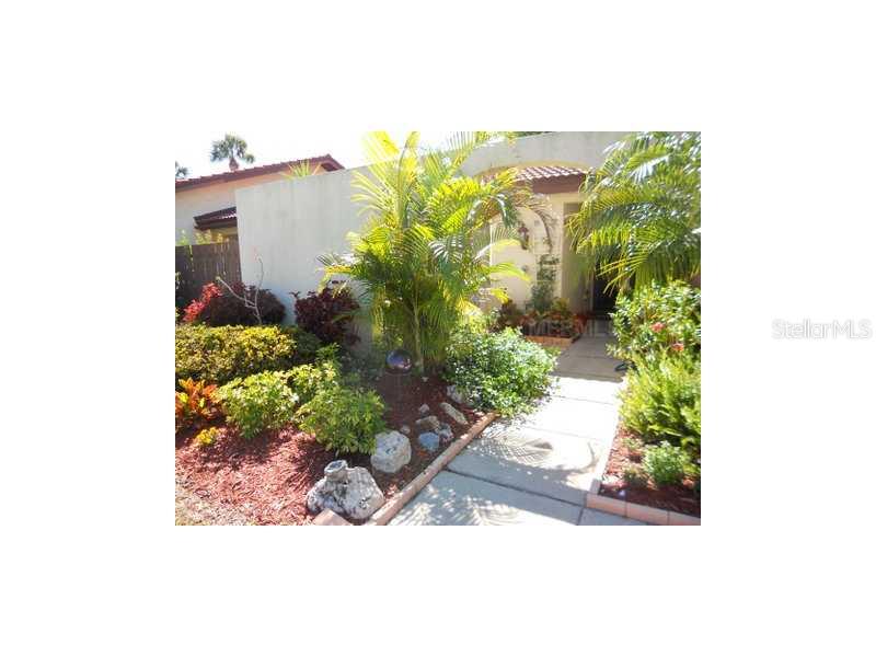 3428 El Rado Court, Unit 8414 Sarasota, FL 34232 - Photo 1 of 1 a view of a garden
