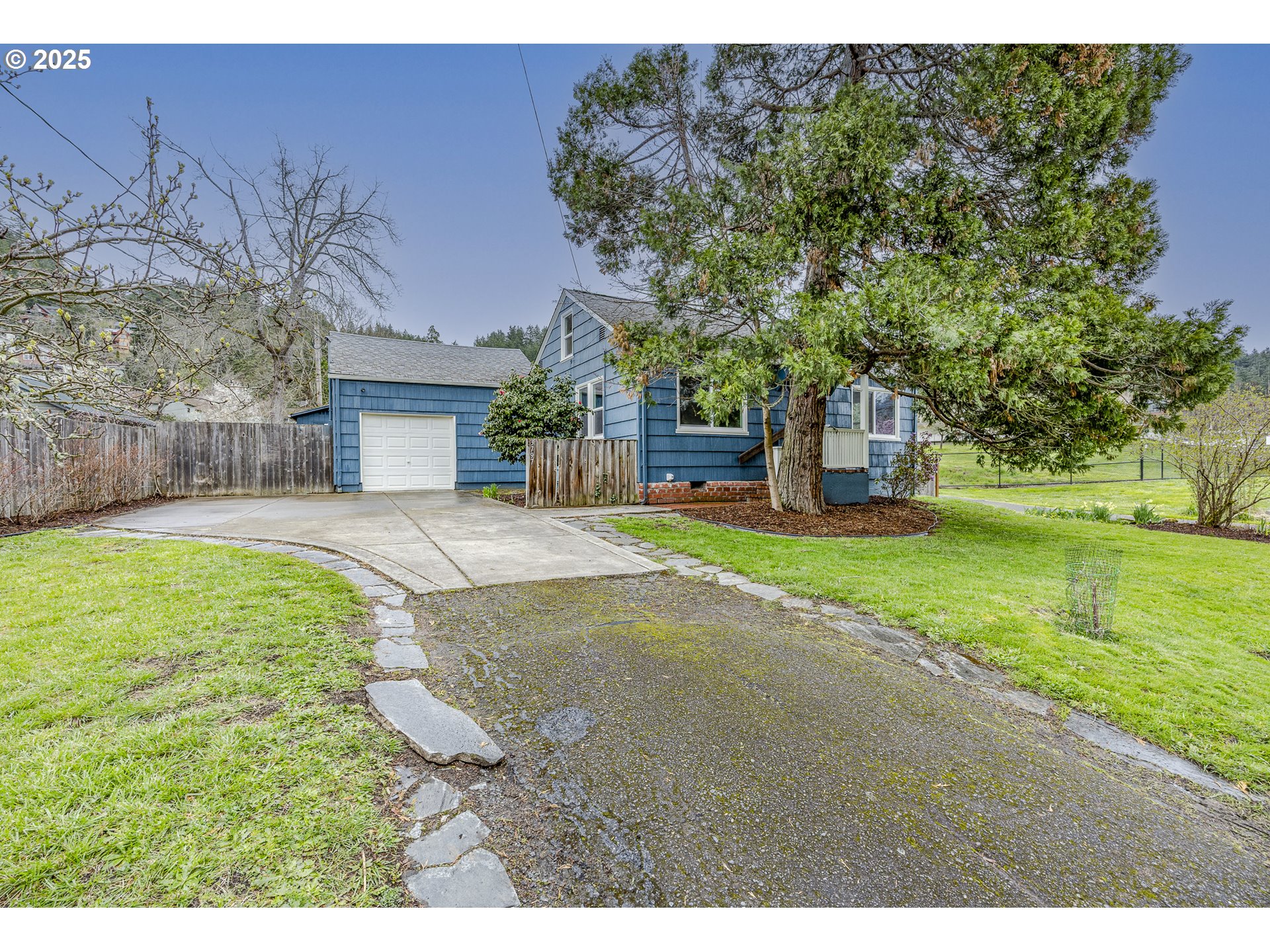 3797 Kincaid Street Eugene, OR 97405 - Photo 2 of 37 a view of a house with a yard and tree s