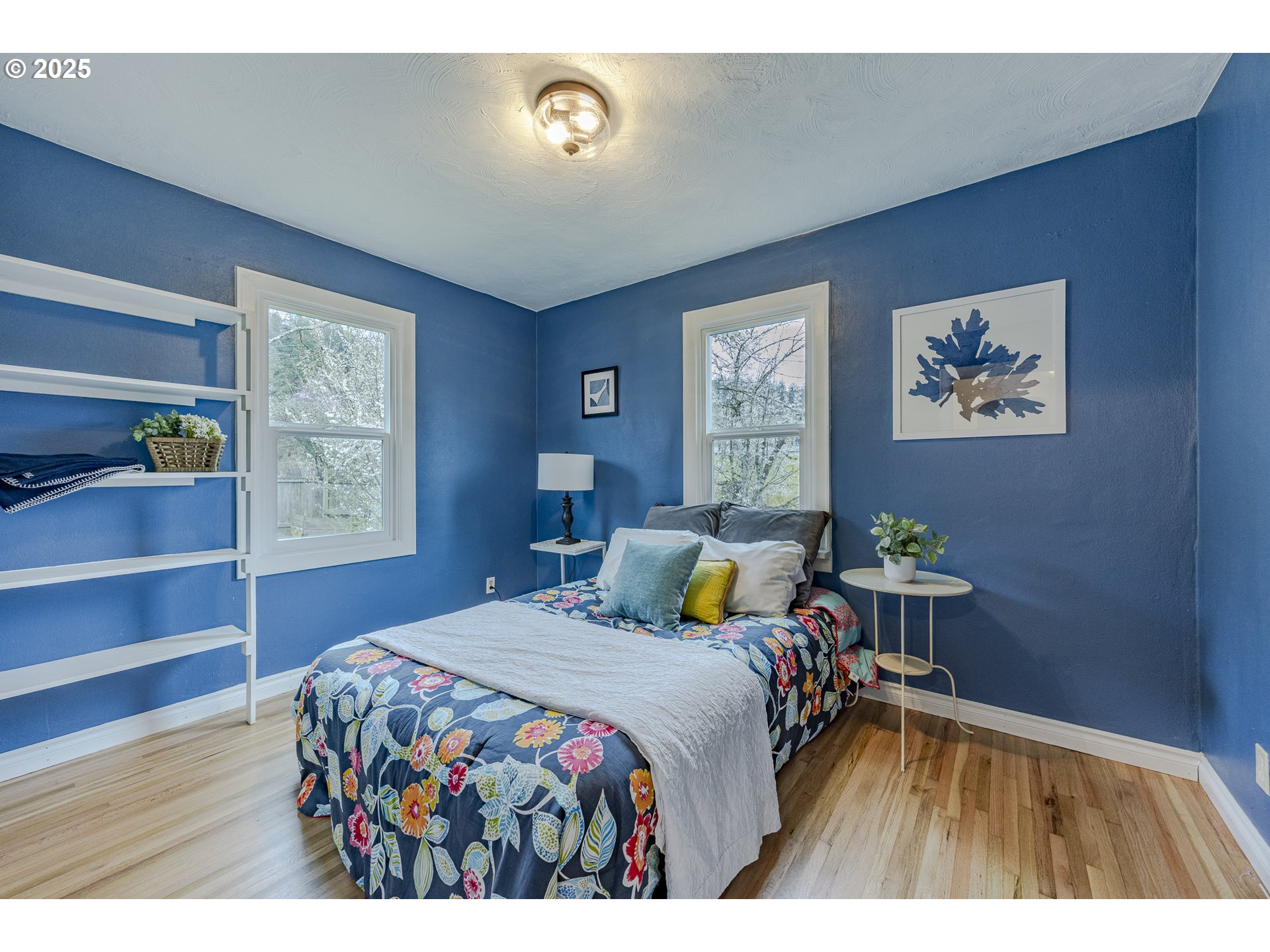 3797 Kincaid Street Eugene, OR 97405 - Photo 22 of 37 a bedroom with a bed and a window