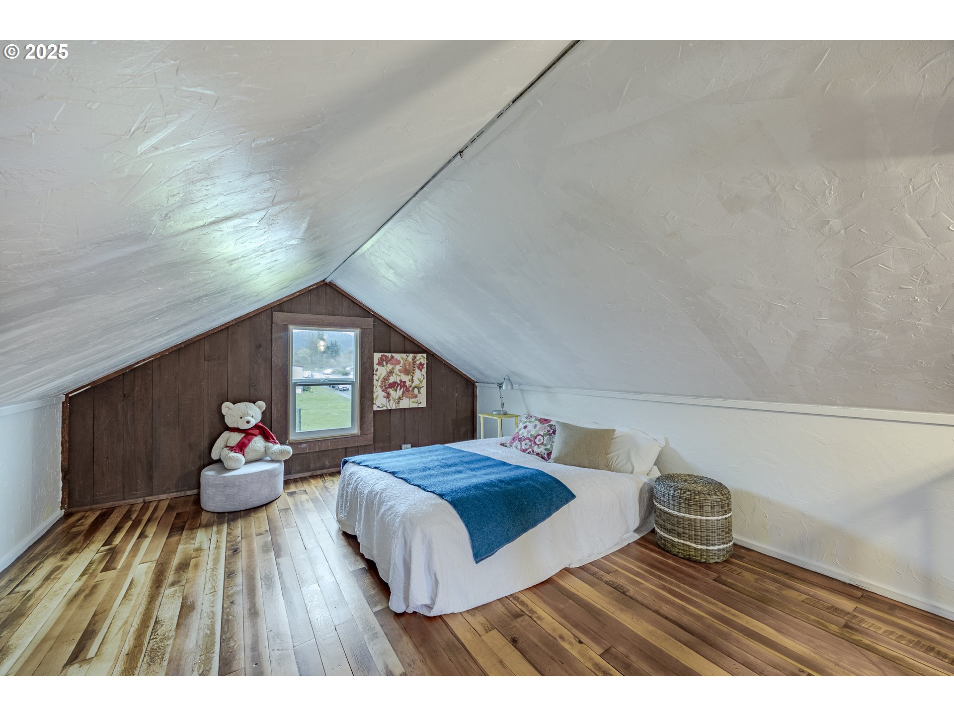 3797 Kincaid Street Eugene, OR 97405 - Photo 32 of 37 a bedroom with a bed and a dresser