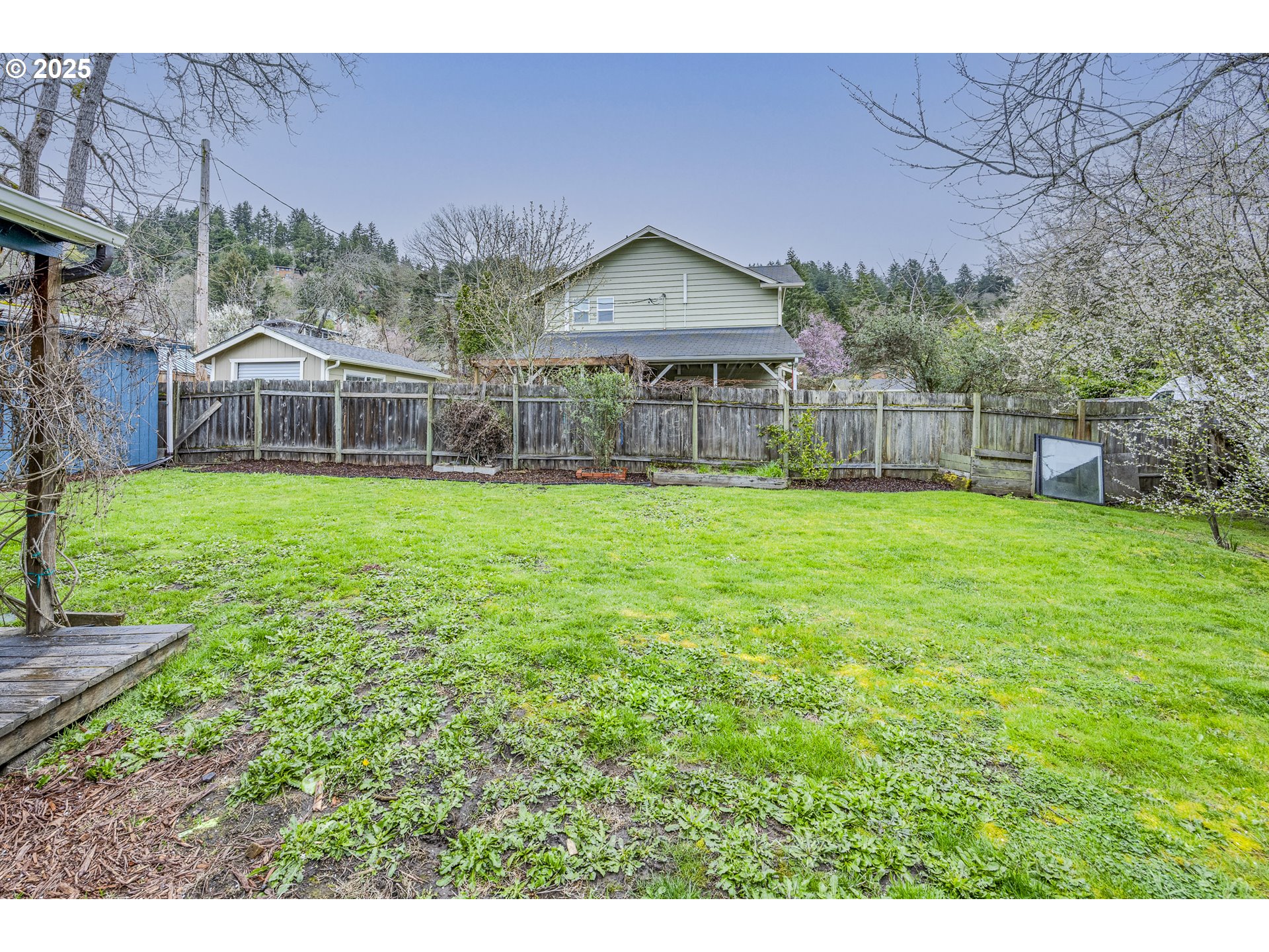 3797 Kincaid Street Eugene, OR 97405 - Photo 37 of 37 a view of a house with a yard and sitting area