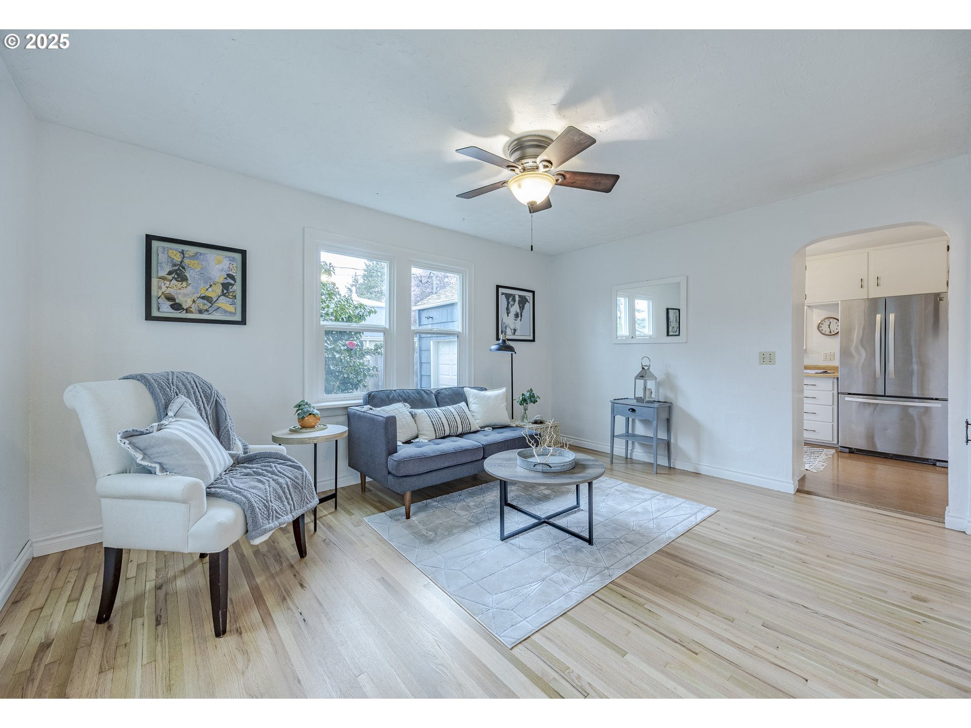 3797 Kincaid Street Eugene, OR 97405 - Photo 7 of 37 a living room with furniture and a wooden floor