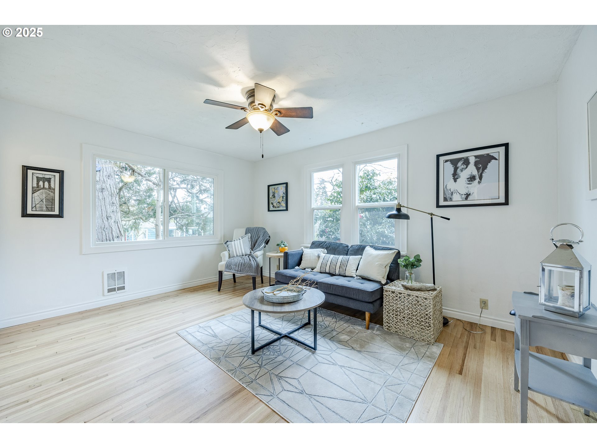 3797 Kincaid Street Eugene, OR 97405 - Photo 9 of 37 a living room with furniture and a wooden floor
