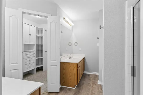 a white bath tub sitting next to a window