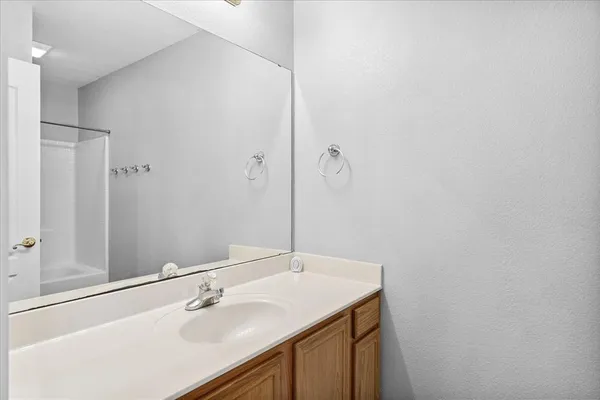 a view of an empty room with a window