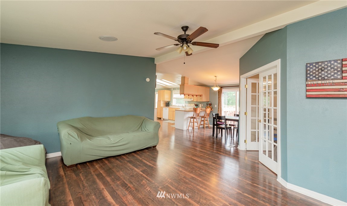 6565 Old Guide Road Bellingham, WA 98226 - Photo 12 of 27 a living room with furniture and a wooden floor