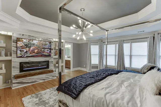 a living room with furniture and a lamp