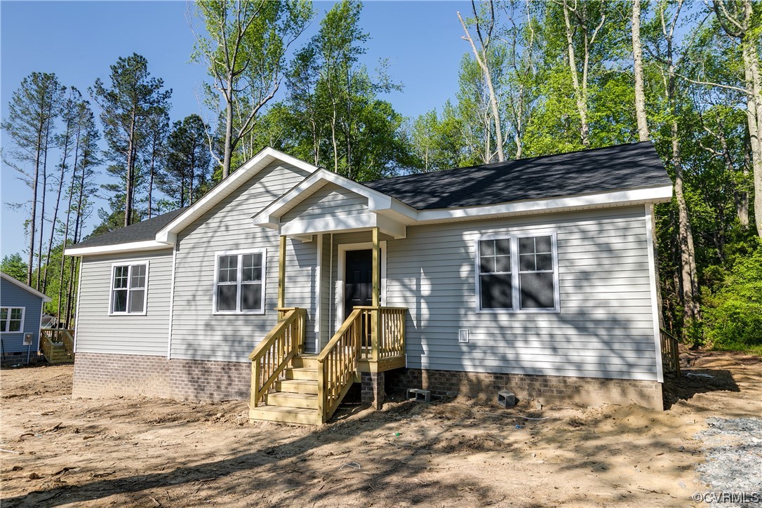 15318 Saddlebrook Road Chesterfield, VA 23838 - Photo 2 of 10 a view of a house with a yard