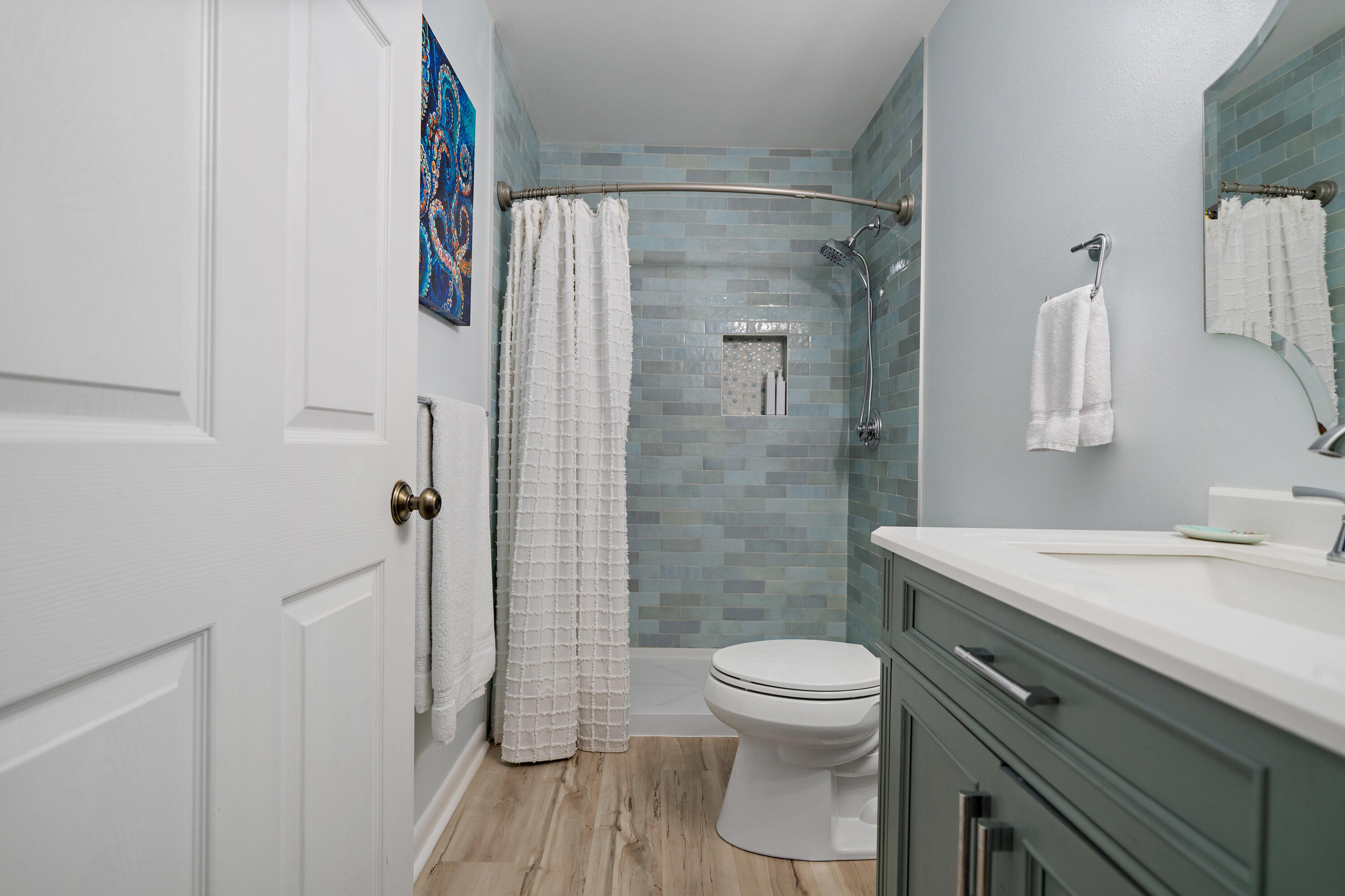 3879 Mesa Road Destin, FL 32541 - Photo 13 of 27 a bathroom with a sink a toilet and shower