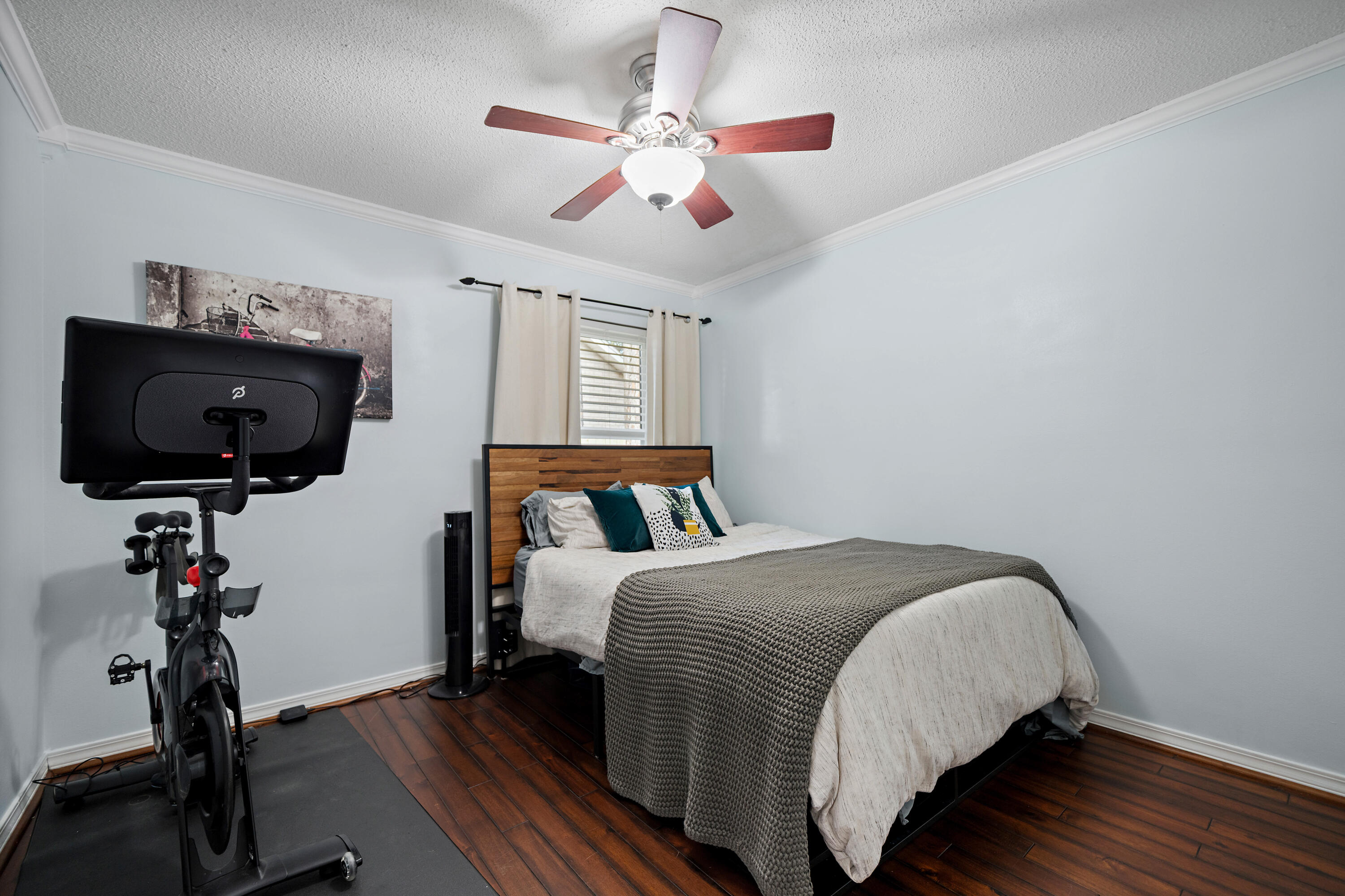 3879 Mesa Road Destin, FL 32541 - Photo 19 of 27 a bedroom with a bed and wooden floor