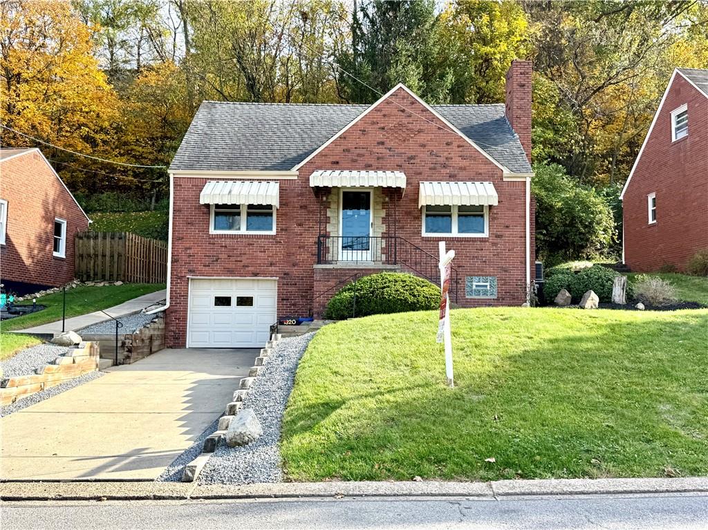 a house view with a garden space