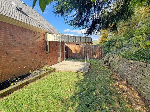 a view of bench sitting in a park