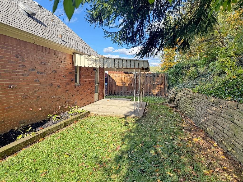 1320 Main Street Bridgeville, PA 15017 - Photo 23 of 26 a view of a backyard with a patio