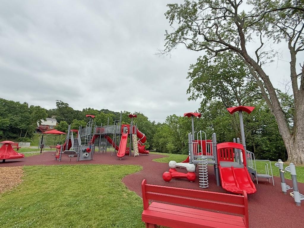 1320 Main Street Bridgeville, PA 15017 - Photo 26 of 26 a view of bench sitting in a park