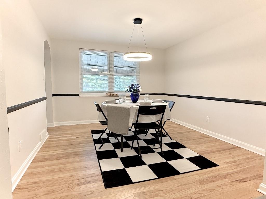 1320 Main Street Bridgeville, PA 15017 - Photo 5 of 26 a view of a dining room with a table and chairs