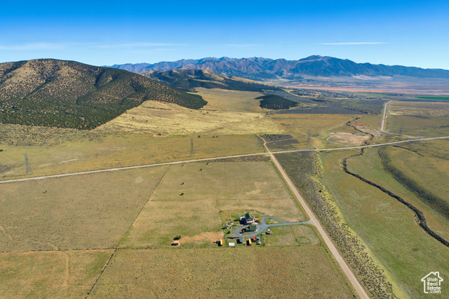 4768 East Hickman Canyon Road Stockton, UT 84071 - Photo 80 of 85 Overview of property featuring a mountain backdrop, east.