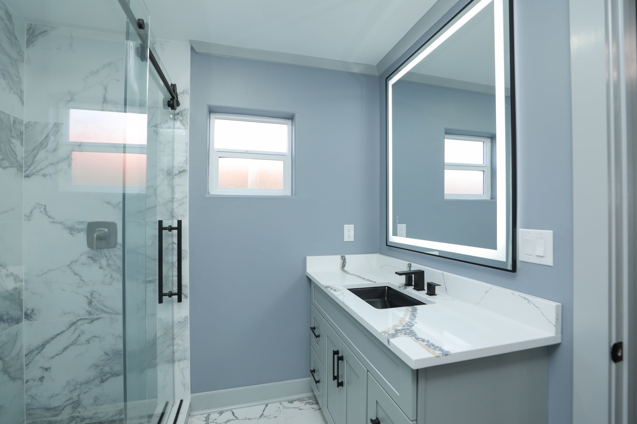 4047 Juliet Street Houston, TX 77087 - Photo 23 of 38 a bathroom with a sink vanity and a mirror