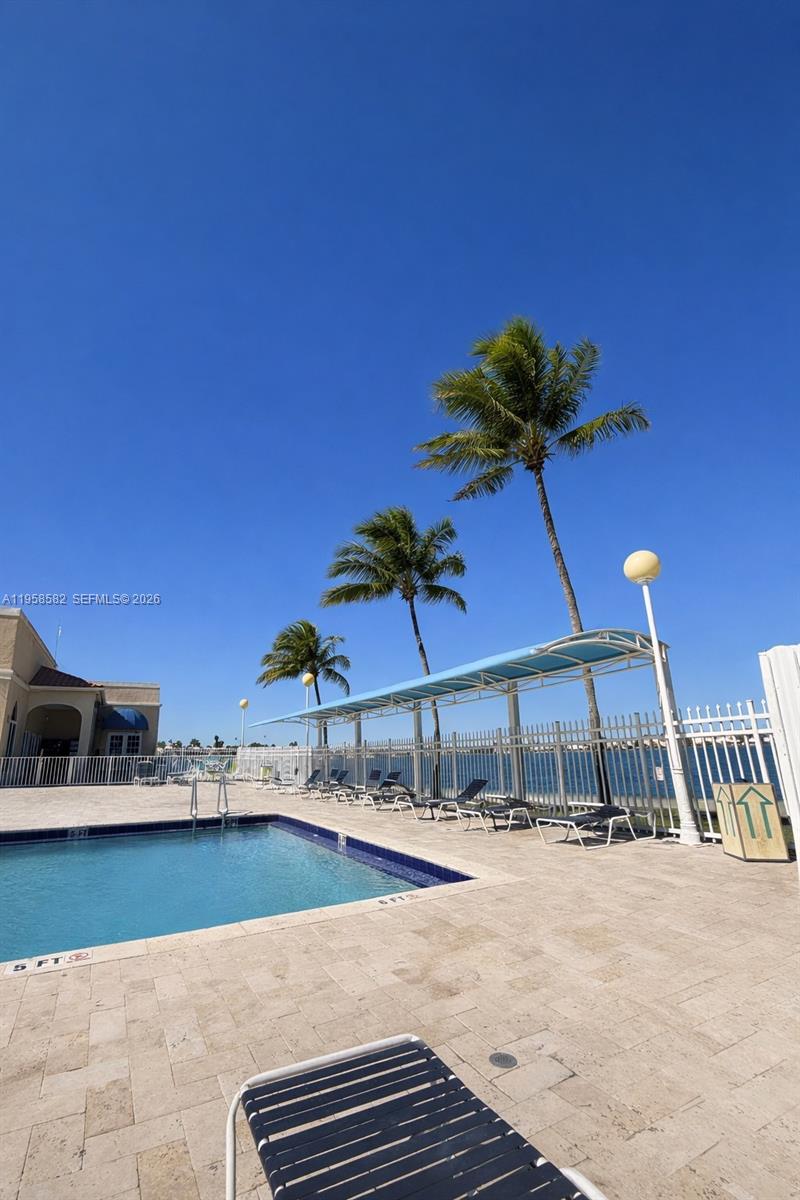 1045 Northwest 126th Place Miami, FL 33182 - Photo 15 of 16 Pool with Lake View