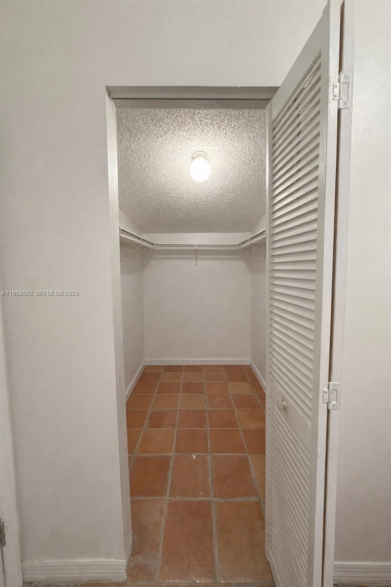 1045 Northwest 126th Place Miami, FL 33182 - Photo 4 of 16 Walk in Closet- Master Bedroom