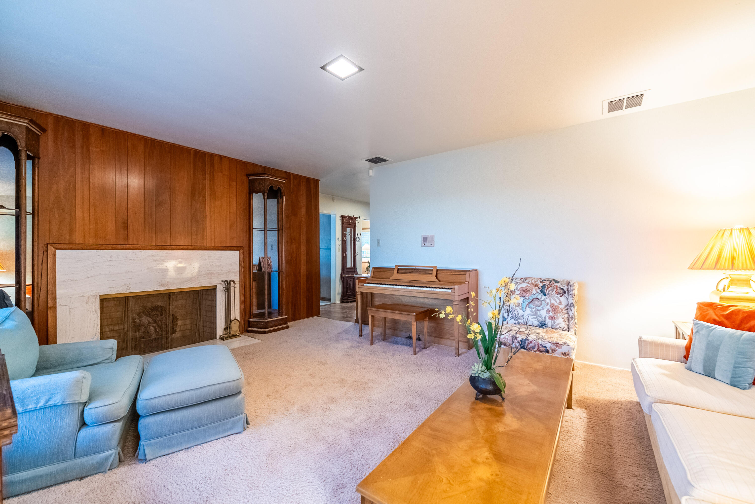 167 Santa Rosa Road El Centro, CA 92243 - Photo 12 of 50 a living room with furniture and a fireplace