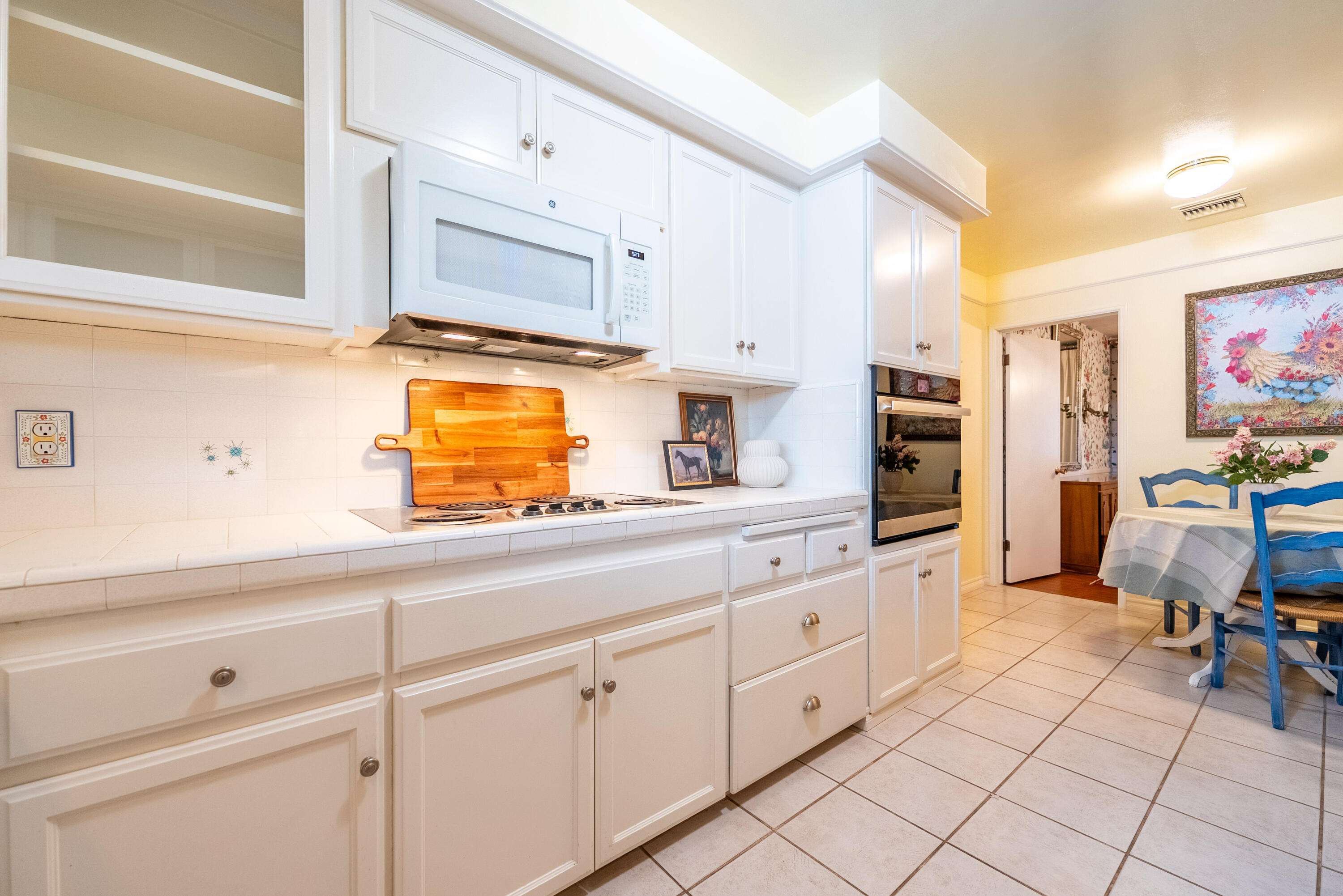167 Santa Rosa Road El Centro, CA 92243 - Photo 17 of 50 a kitchen with cabinets and chairs