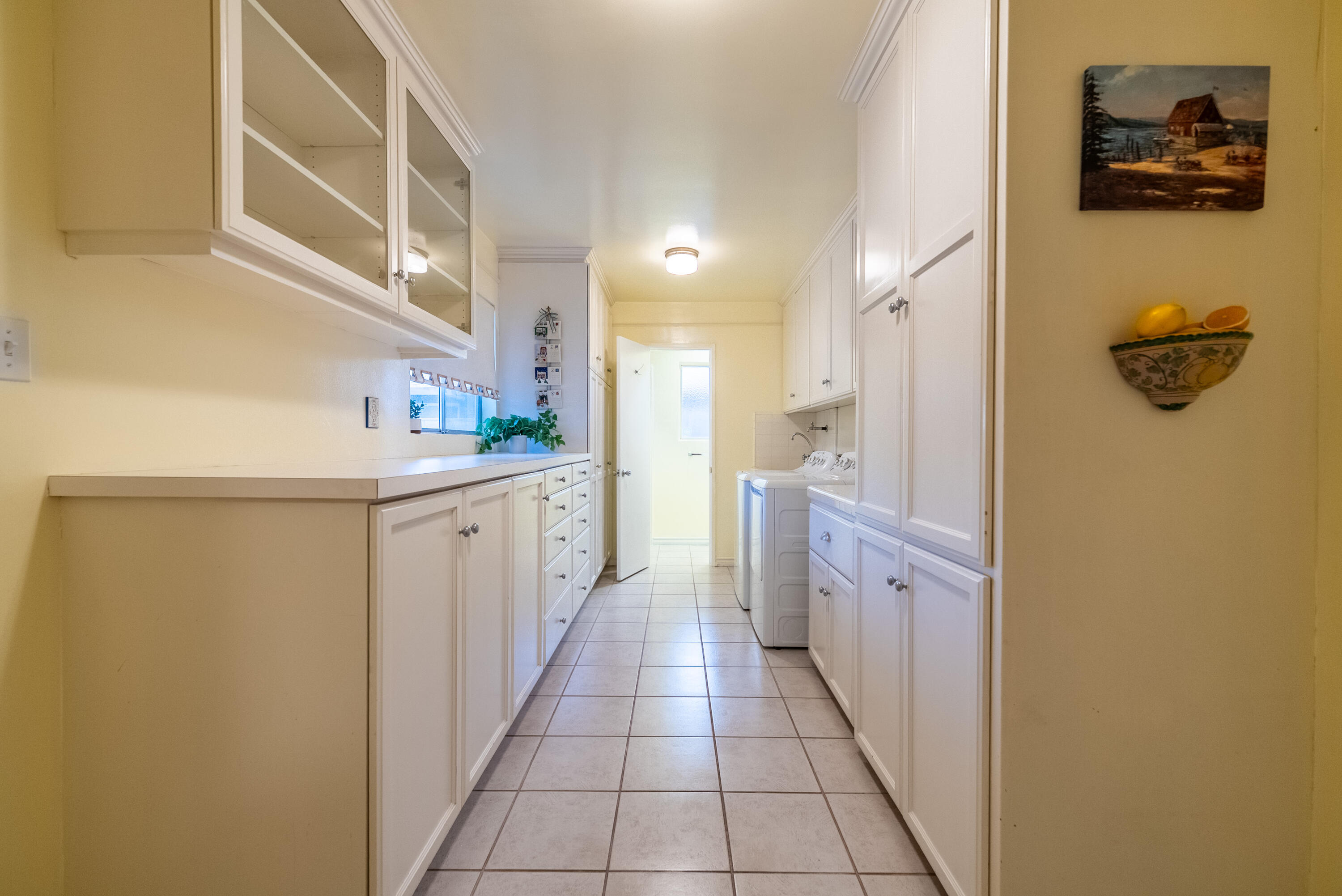 167 Santa Rosa Road El Centro, CA 92243 - Photo 18 of 50 a kitchen with a refrigerator and a sink