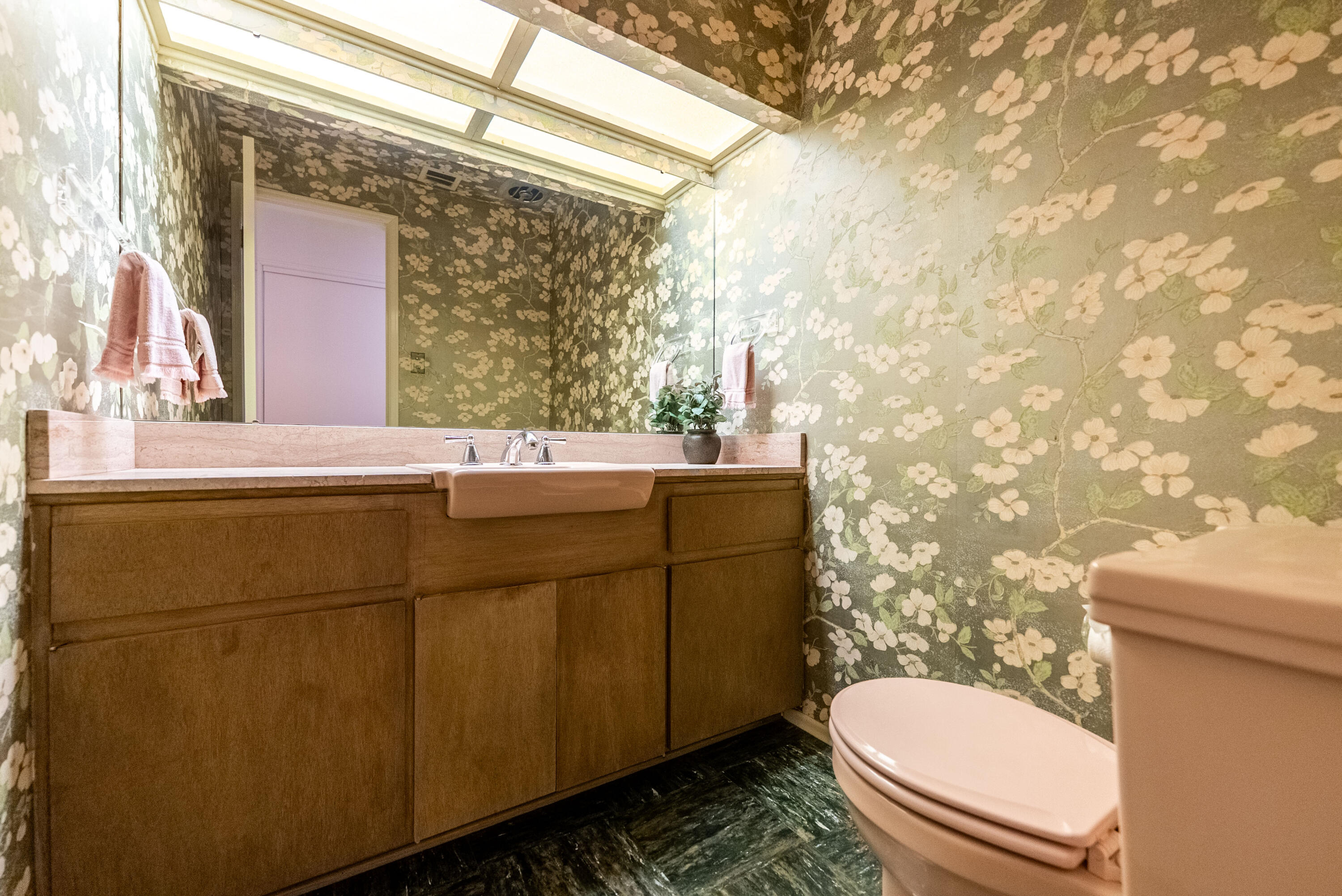 167 Santa Rosa Road El Centro, CA 92243 - Photo 21 of 50 a bathroom with a toilet a sink and mirror