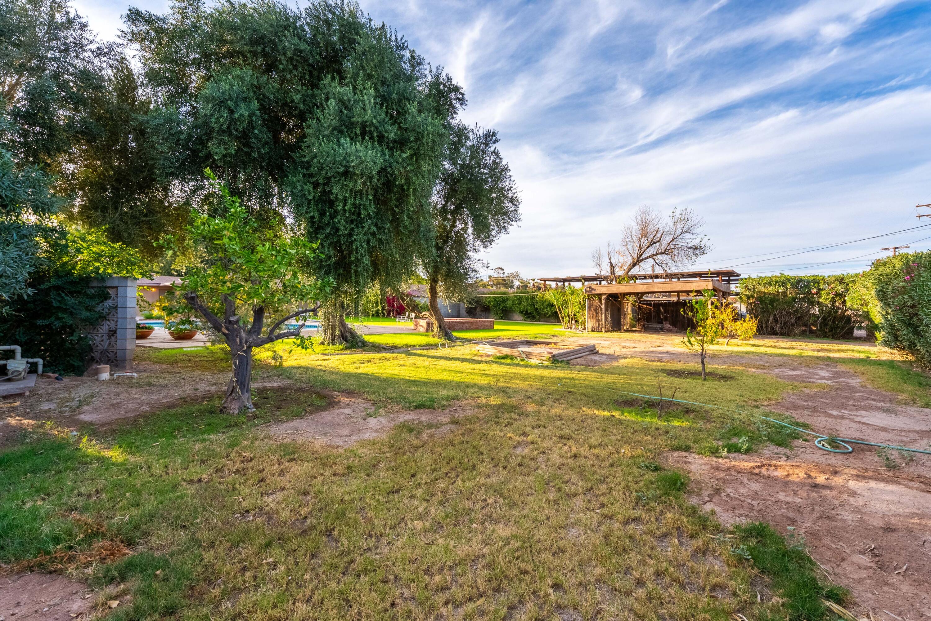 167 Santa Rosa Road El Centro, CA 92243 - Photo 40 of 50 a view of yard with swimming pool and green space