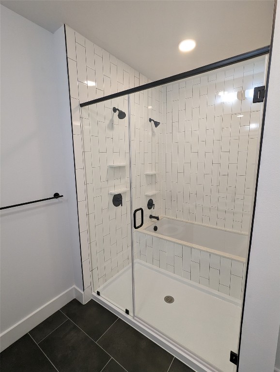 2500 Longview Street, Unit 322 Austin, TX 78705 - Photo 13 of 25 a bathroom with a glass shower door
