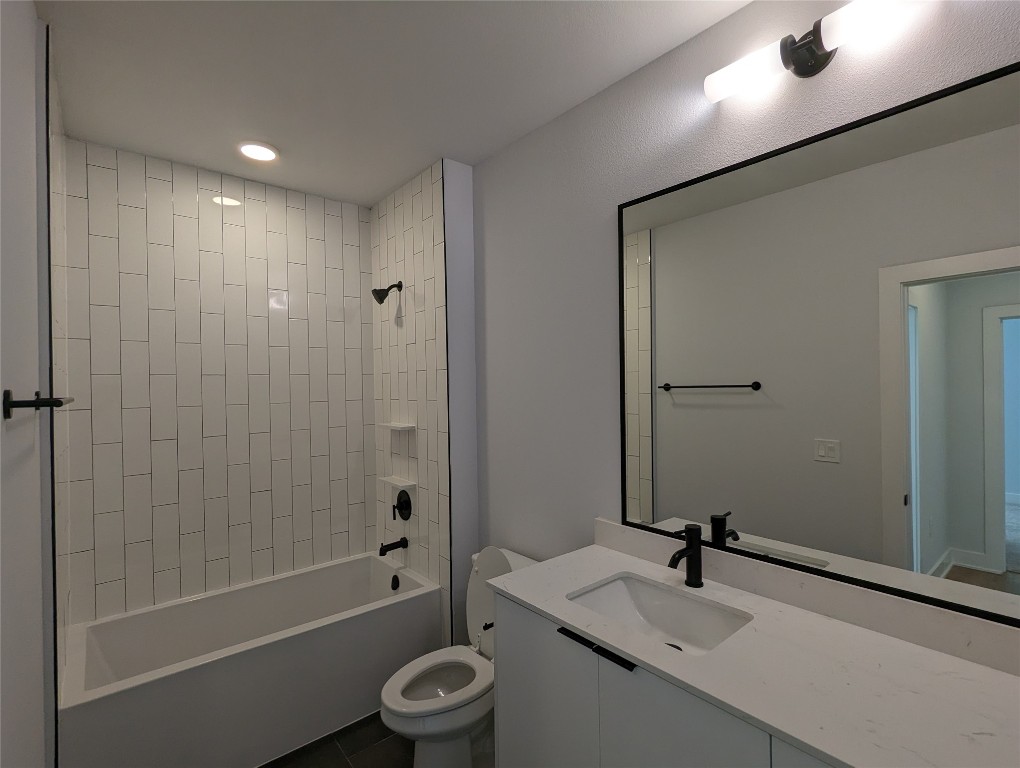2500 Longview Street, Unit 322 Austin, TX 78705 - Photo 15 of 25 a bathroom with a sink toilet and shower