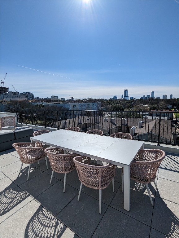 2500 Longview Street, Unit 322 Austin, TX 78705 - Photo 22 of 25 a terrace with a table and chairs