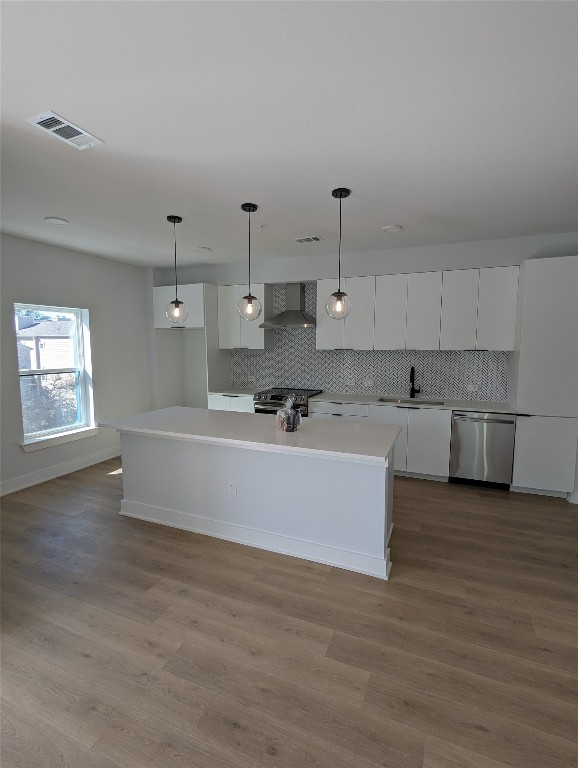 2500 Longview Street, Unit 322 Austin, TX 78705 - Photo 25 of 25 a view of kitchen with stainless steel appliances granite countertop a stove a sink and white cabinets