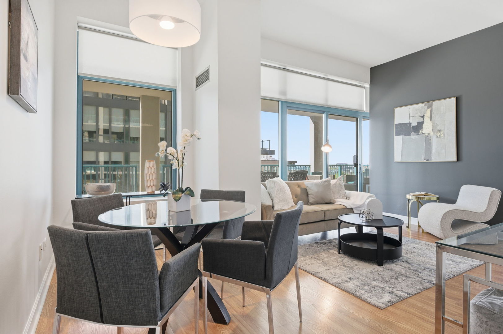 340 West Superior Street, Unit 1009 Chicago, IL 60654 - Photo 12 of 24 a living room with furniture and a large window