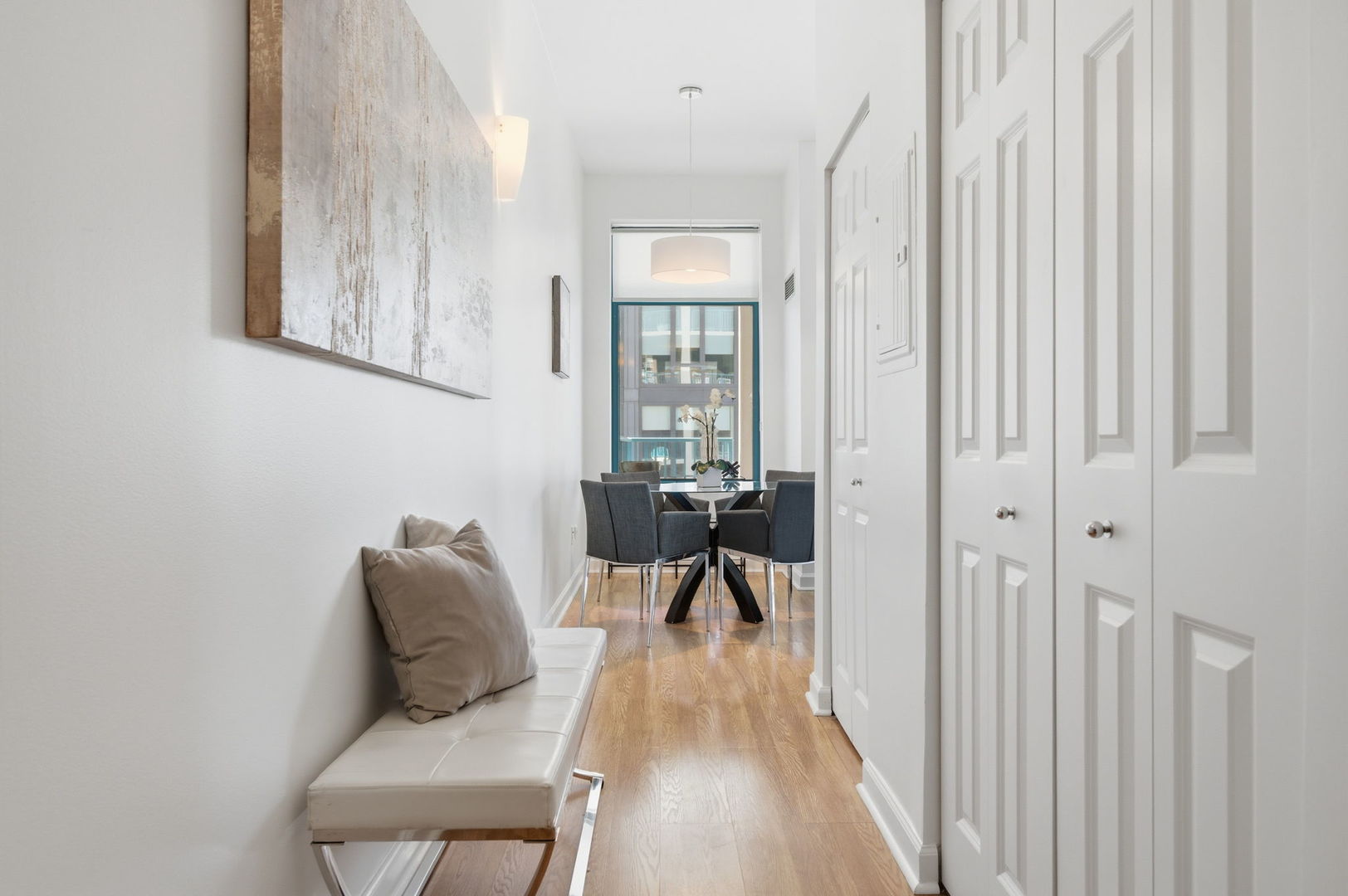 340 West Superior Street, Unit 1009 Chicago, IL 60654 - Photo 13 of 24 a view of a livingroom with furniture and a window