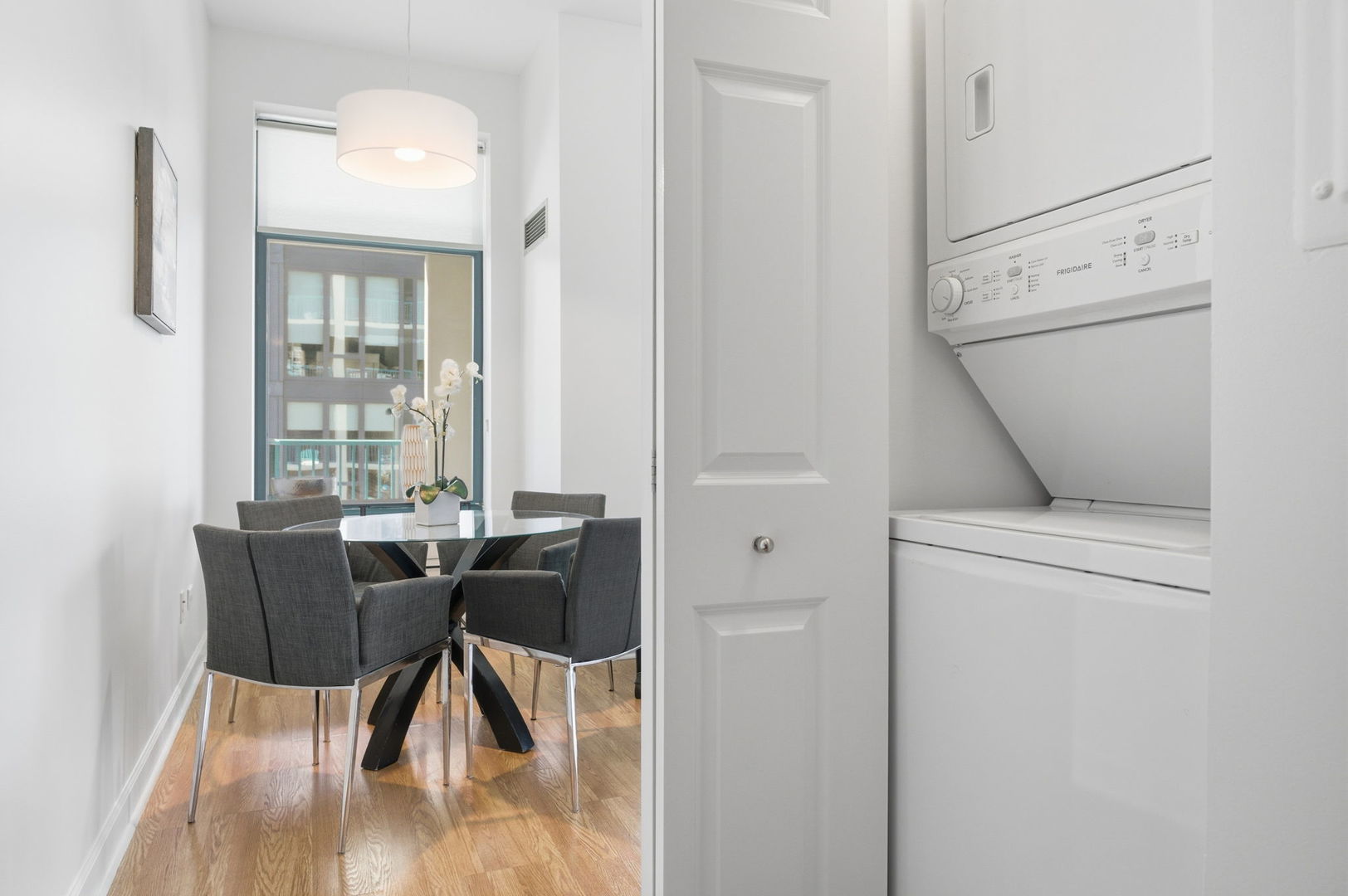 340 West Superior Street, Unit 1009 Chicago, IL 60654 - Photo 14 of 24 a view of a dining room with furniture and wooden floor