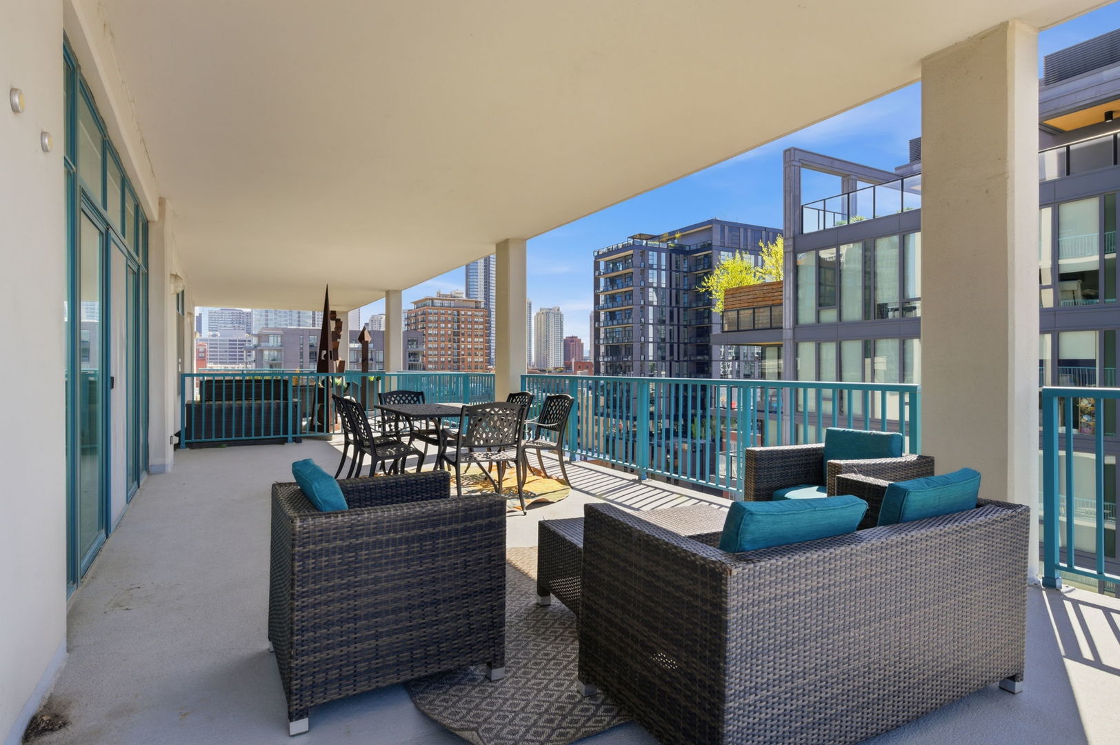 340 West Superior Street, Unit 1009 Chicago, IL 60654 - Photo 16 of 24 a outdoor living space with patio furniture and a potted plant