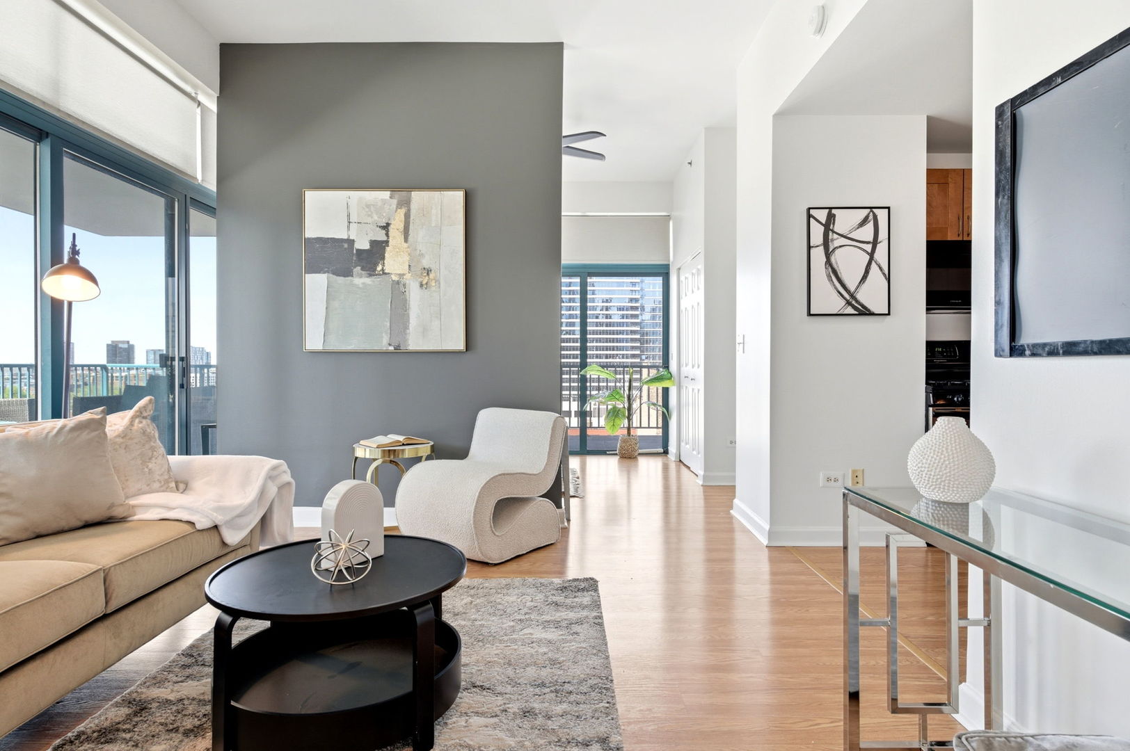 340 West Superior Street, Unit 1009 Chicago, IL 60654 - Photo 2 of 24 a living room with furniture and wooden floor