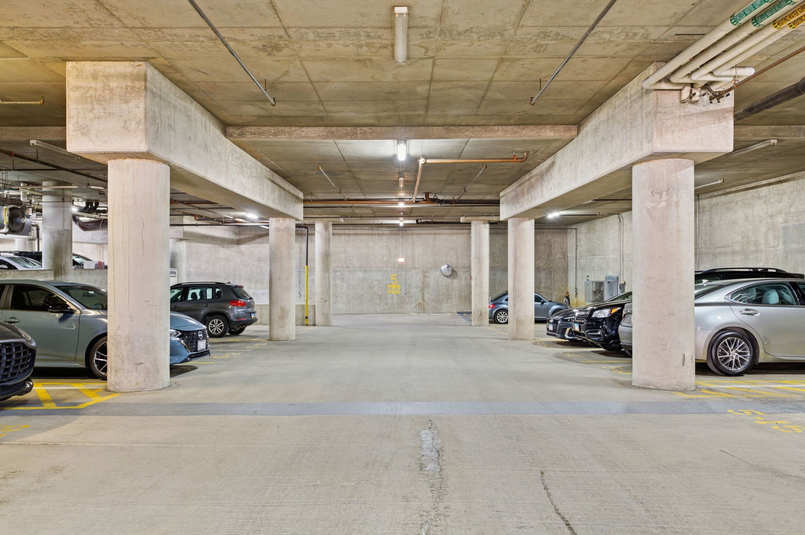 340 West Superior Street, Unit 1009 Chicago, IL 60654 - Photo 23 of 24 a view of parking garage with cars