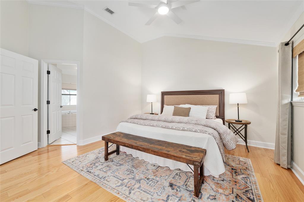 303 Southwest 129 Terrace Newberry, FL 32669 - Photo 28 of 75 a bedroom with a bed and wooden floor