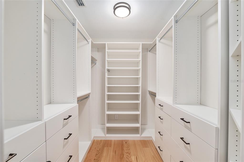 303 Southwest 129 Terrace Newberry, FL 32669 - Photo 37 of 75 a view of walk in closet with empty racks