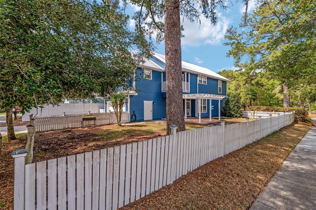 303 Southwest 129 Terrace Newberry, FL 32669 - Photo 53 of 75 a view of a house with large tree