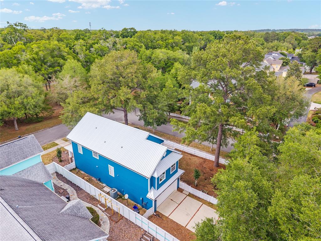 303 Southwest 129 Terrace Newberry, FL 32669 - Photo 61 of 75 an aerial view of a house with a yard