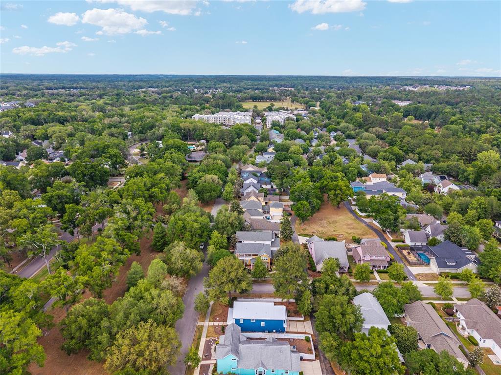 303 Southwest 129 Terrace Newberry, FL 32669 - Photo 64 of 75 an aerial view of a city with lots of residential buildings