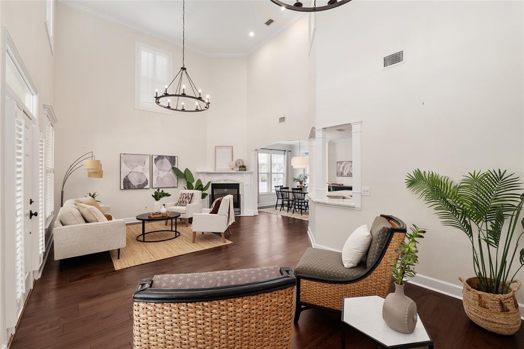 303 Southwest 129 Terrace Newberry, FL 32669 - Photo 10 of 75 a living room with furniture or couch and a potted plant