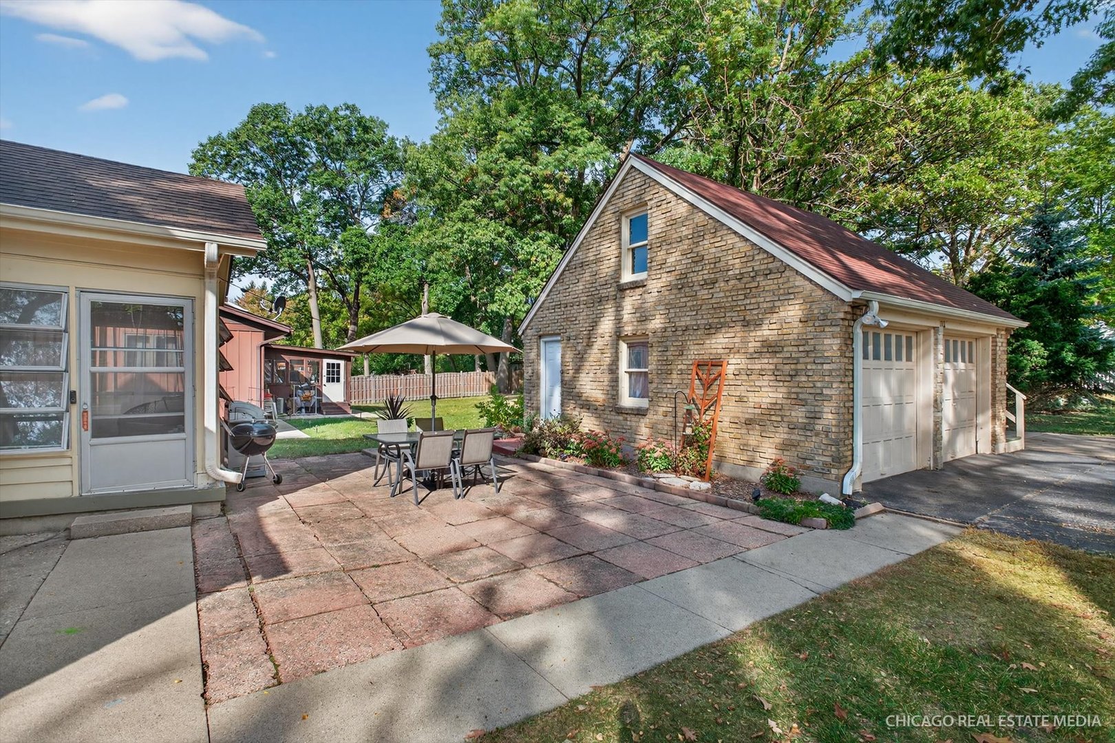 844 Bode Road Elgin, IL 60120 - Photo 25 of 34 a backyard of a house with table and chairs
