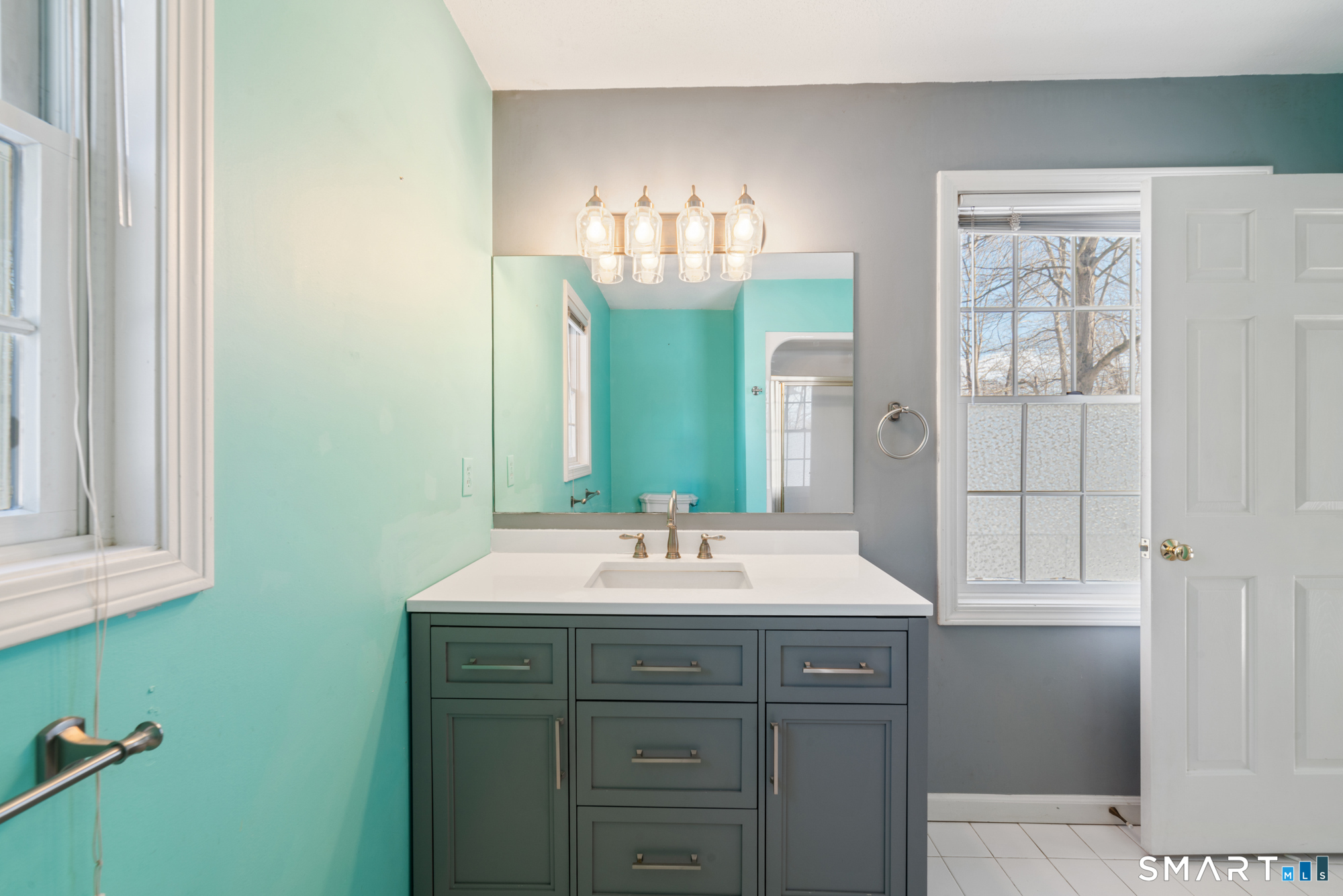 165 Garrigus Court Wolcott, CT 06716 - Photo 24 of 40 a bathroom with a sink and a mirror