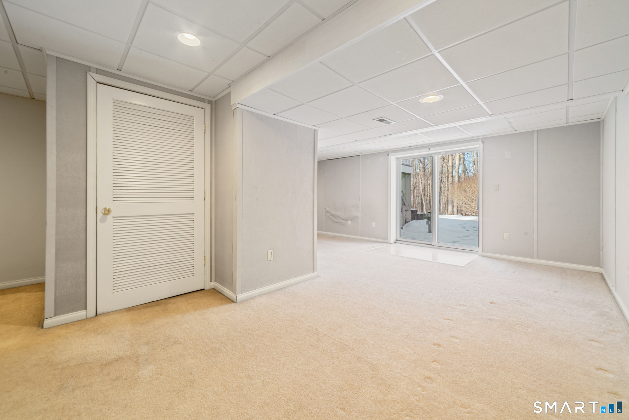 165 Garrigus Court Wolcott, CT 06716 - Photo 33 of 40 an empty room with a empty space and windows