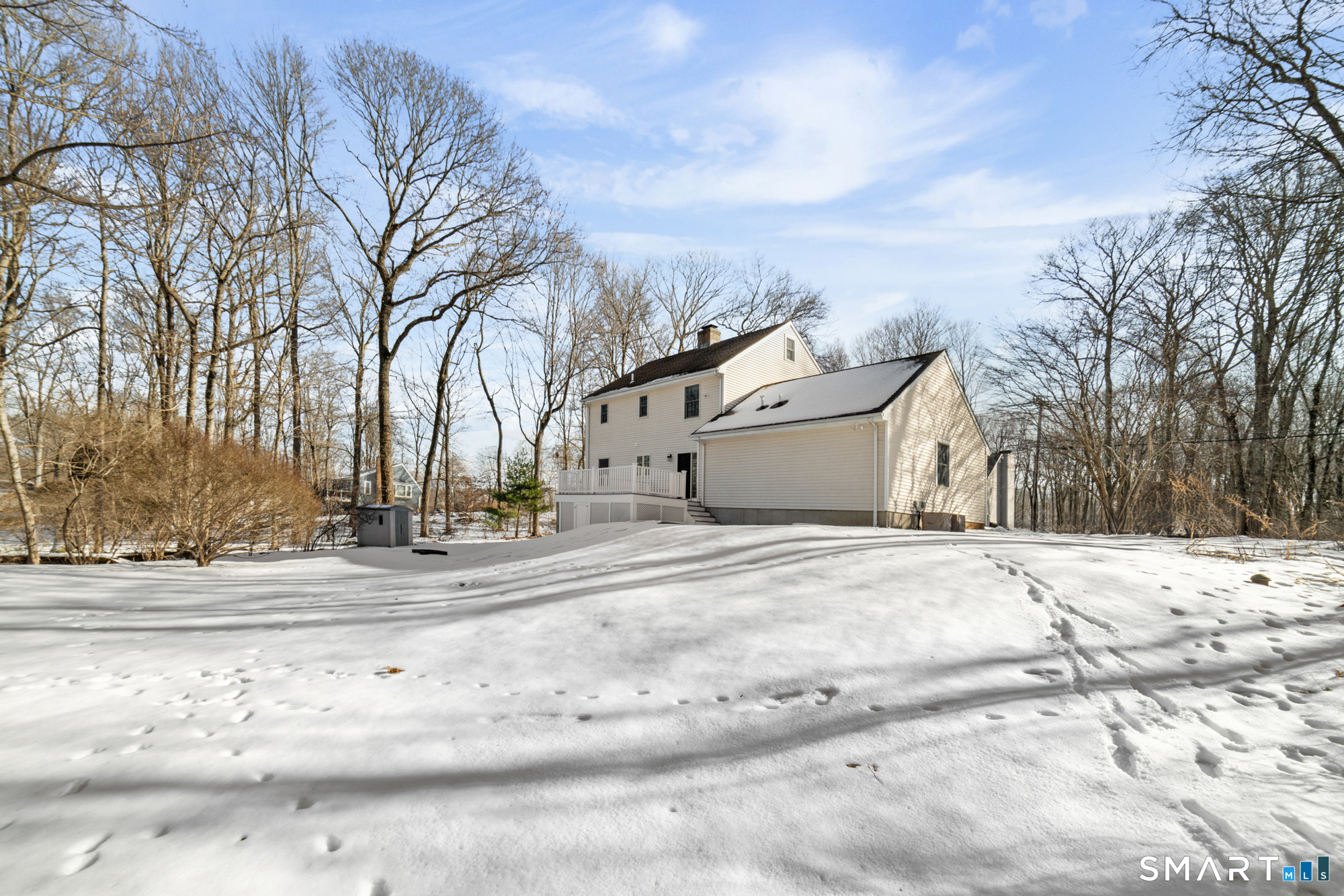 165 Garrigus Court Wolcott, CT 06716 - Photo 40 of 40 a view of a white house with a snow on the road