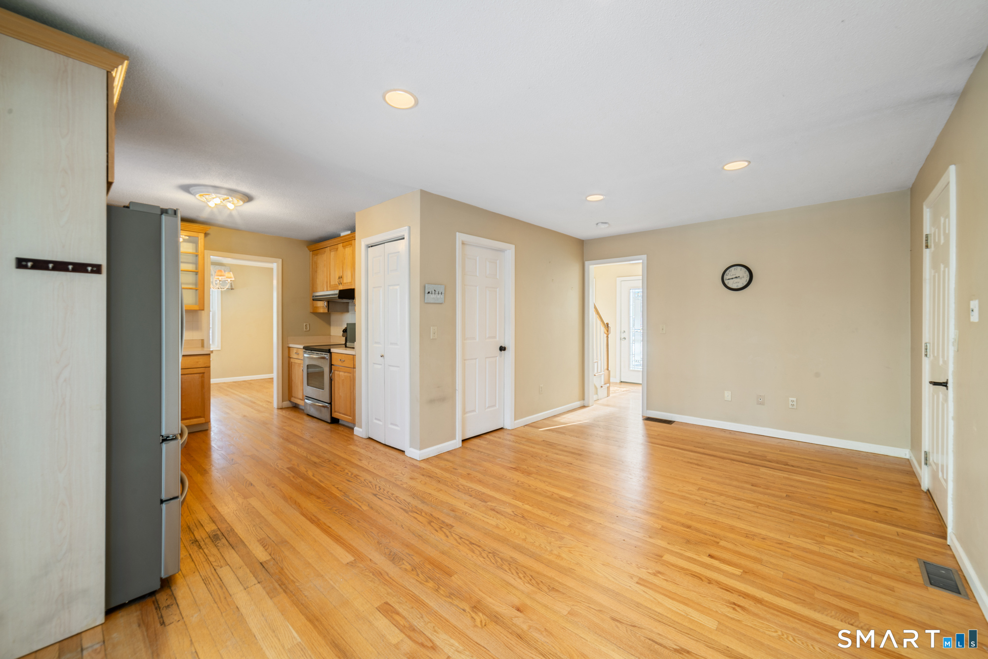 165 Garrigus Court Wolcott, CT 06716 - Photo 7 of 40 a view of a livingroom with wooden floor